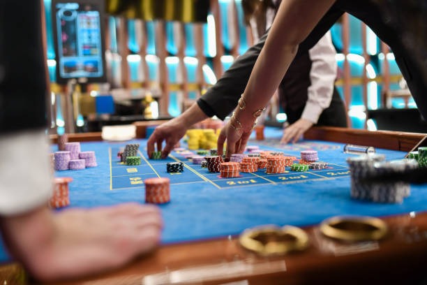 12 togel live-dealer studio with professional croupiers and multi-camera setup